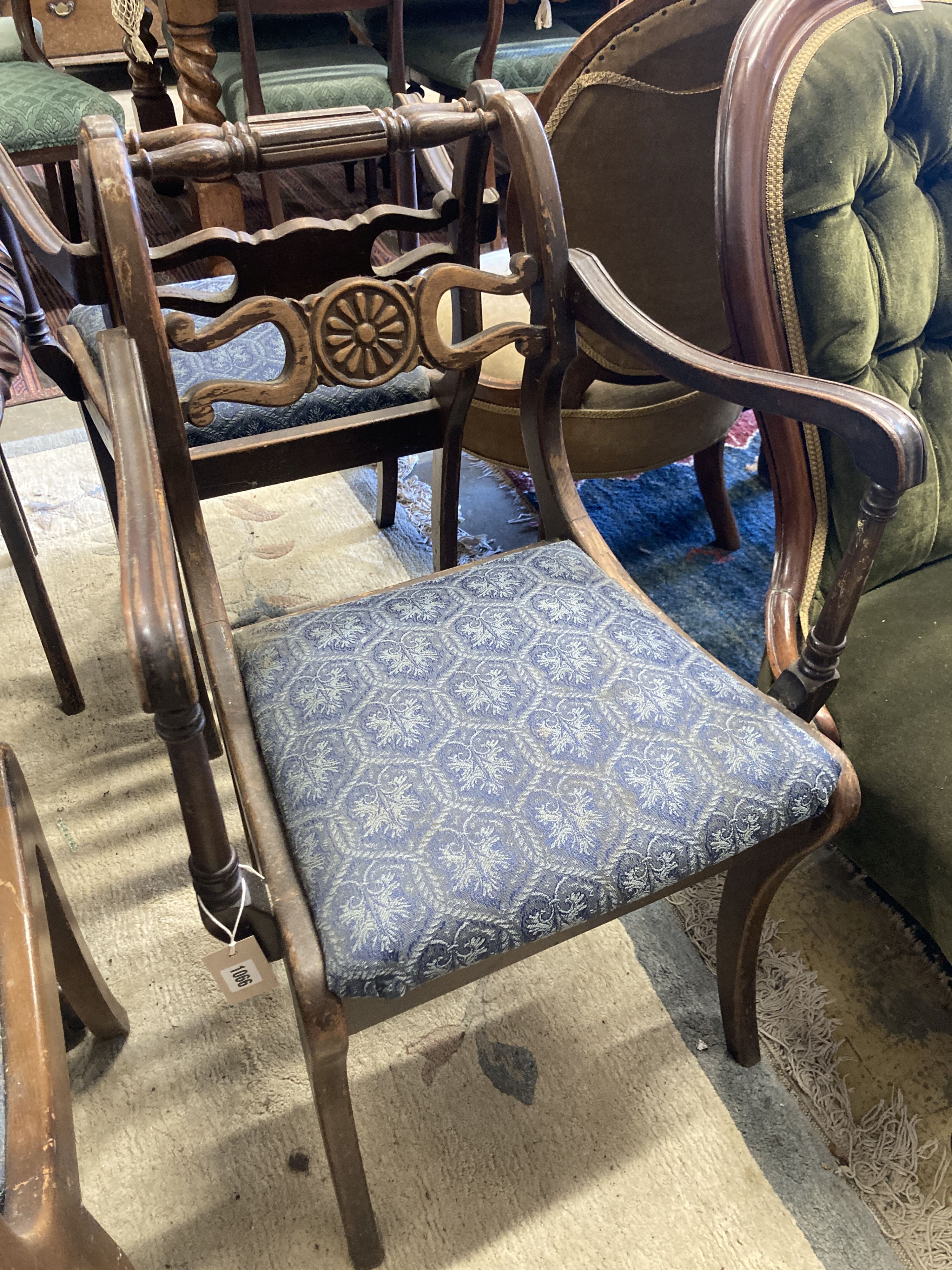 A set of eight Regency style beech dining chairs, two with arms